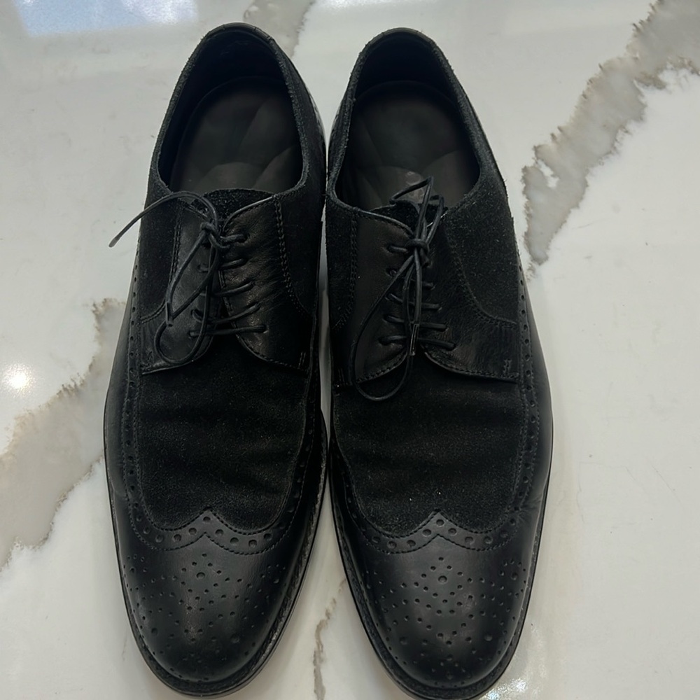 Hugo Boss man’s size 7 .